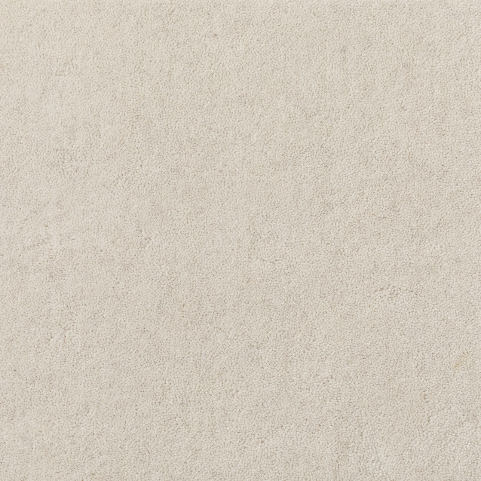 Warm vanilla cream carpet with a dense, softly mottled short pile