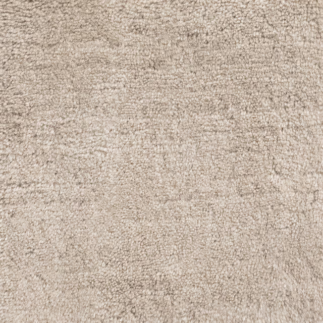 Close-up of Birch’s pale taupe, nubby mottled carpet texture with cream and grey flecks
