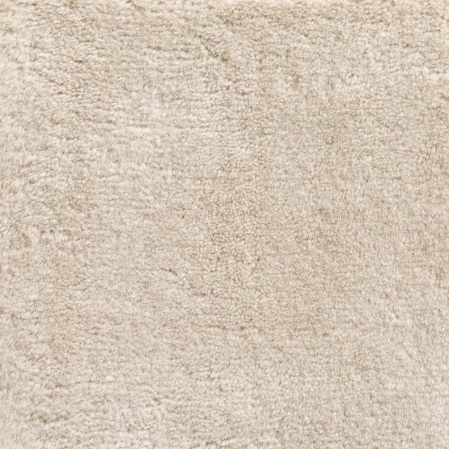 Warm ivory-beige carpet swatch with dense nubby pile and subtle greige mottling