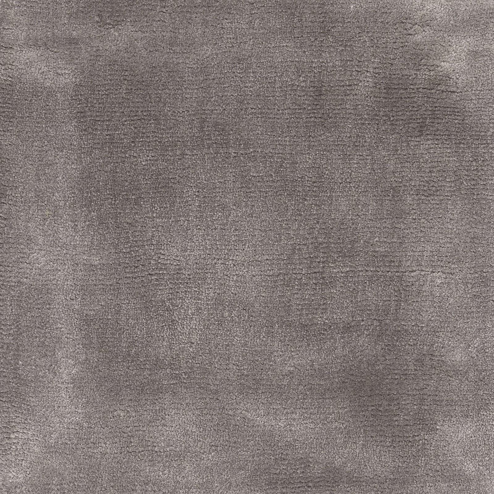Mottled mushroom taupe-grey carpet with a dense, subtly directional woven texture