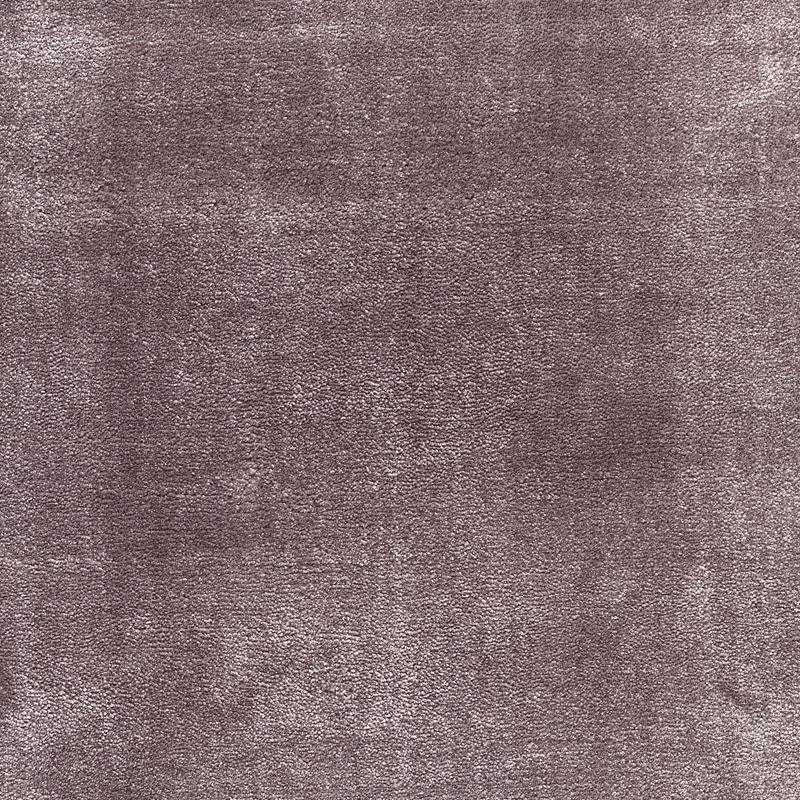 Mottled dusty amethyst carpet surface with fine taupe-purple texture