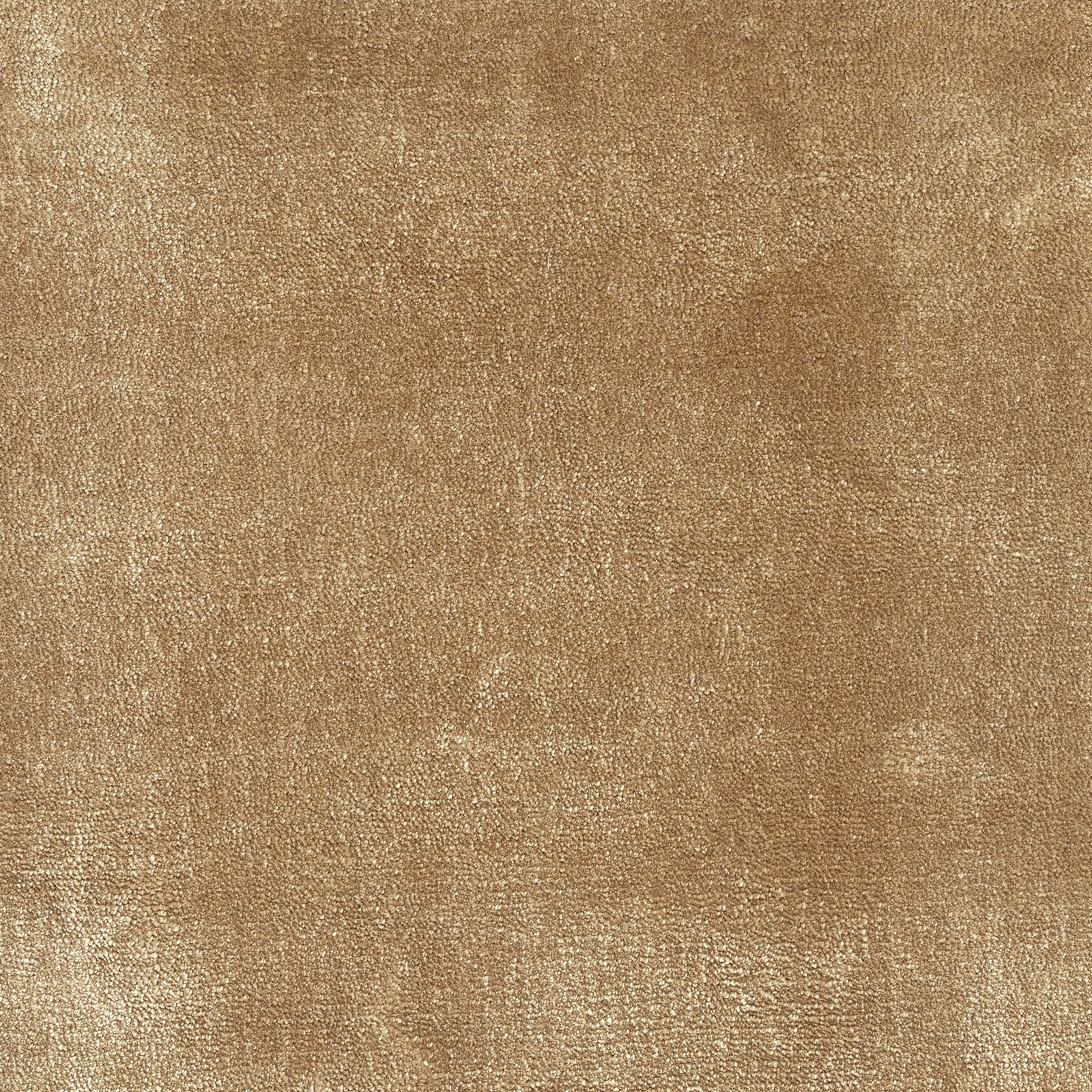 Warm camel carpet textile with dense granular weave and softly mottled tonal shading