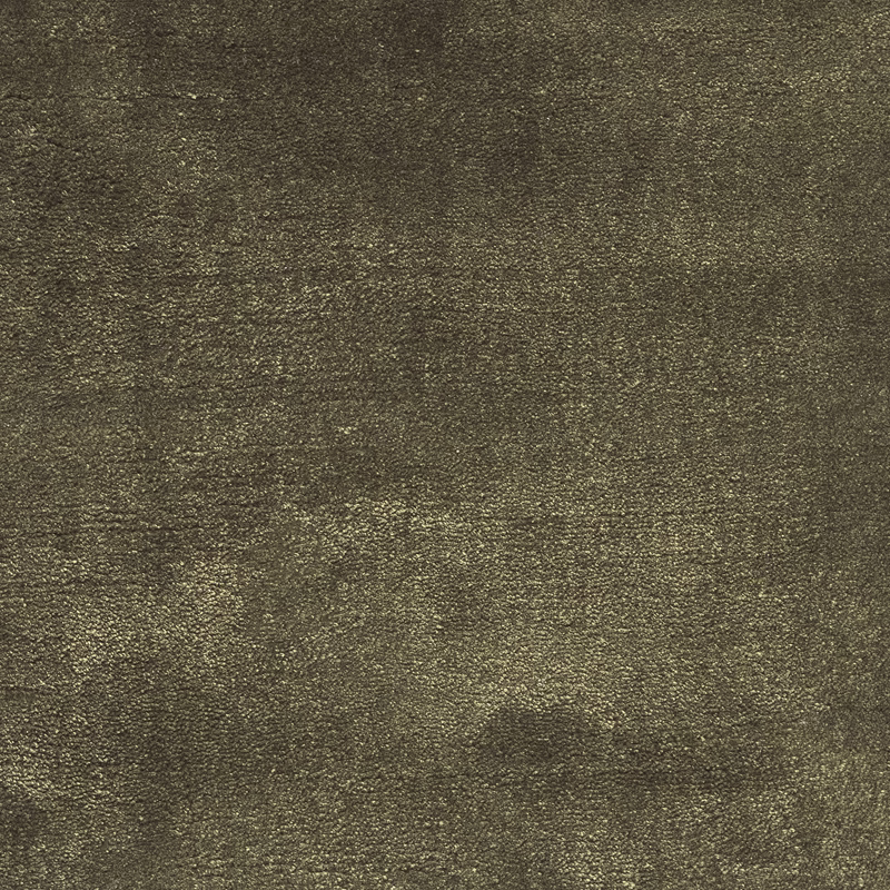 Mottled olive-brown carpet surface with fine nubby texture and subdued sheen