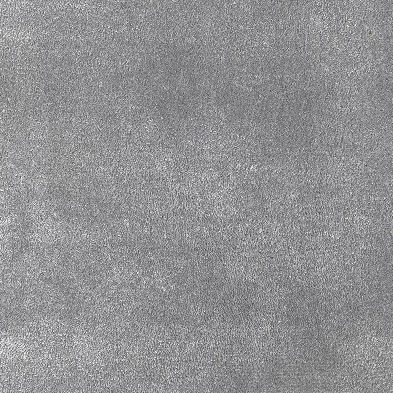 Cool moonstone-grey carpet with a softly mottled, fine-grain surface
