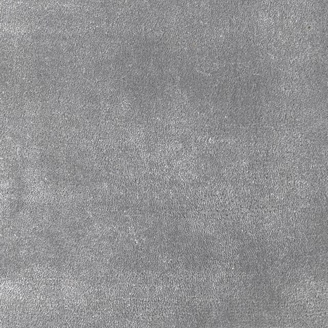 Cool moonstone-grey carpet with a softly mottled, fine-grain surface
