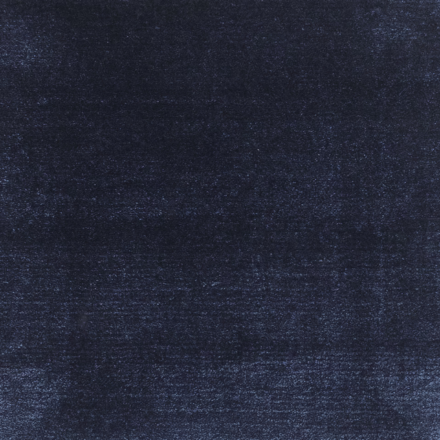 Deep navy textile with subtle blue-grey flecks and irregular horizontal texture