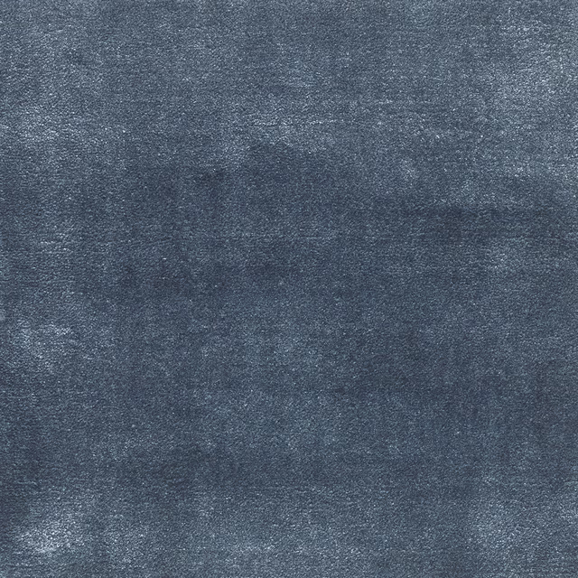 Deep sapphire blue-grey carpet with softly mottled, tactile surface texture