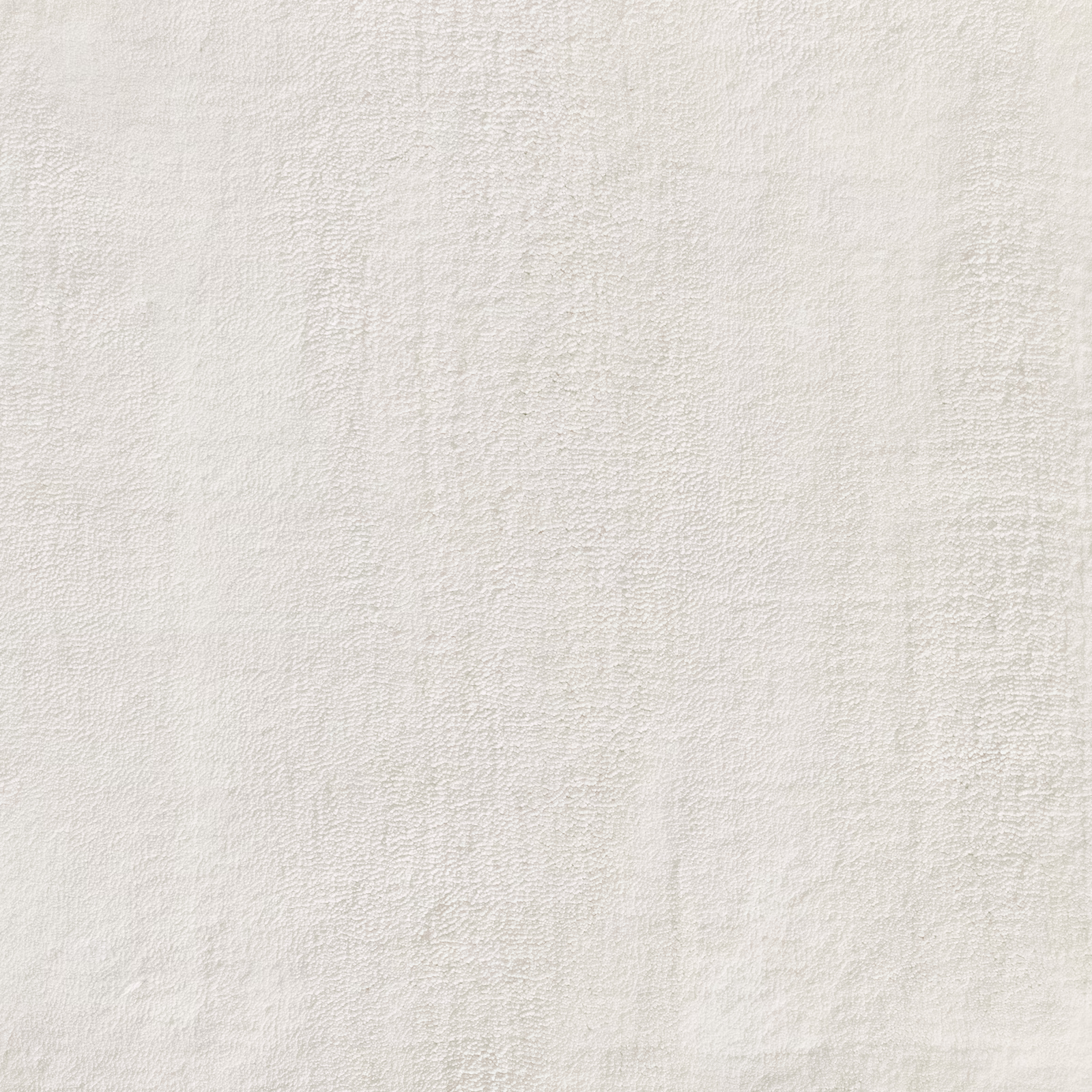 Warm ivory-white Kheri carpet textile with fine irregular texture and subtle vertical shading