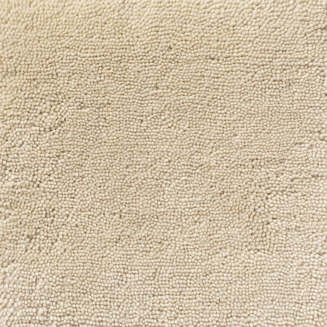 Warm chamomile cream carpet with dense nubby loops and subtle beige tonal variation