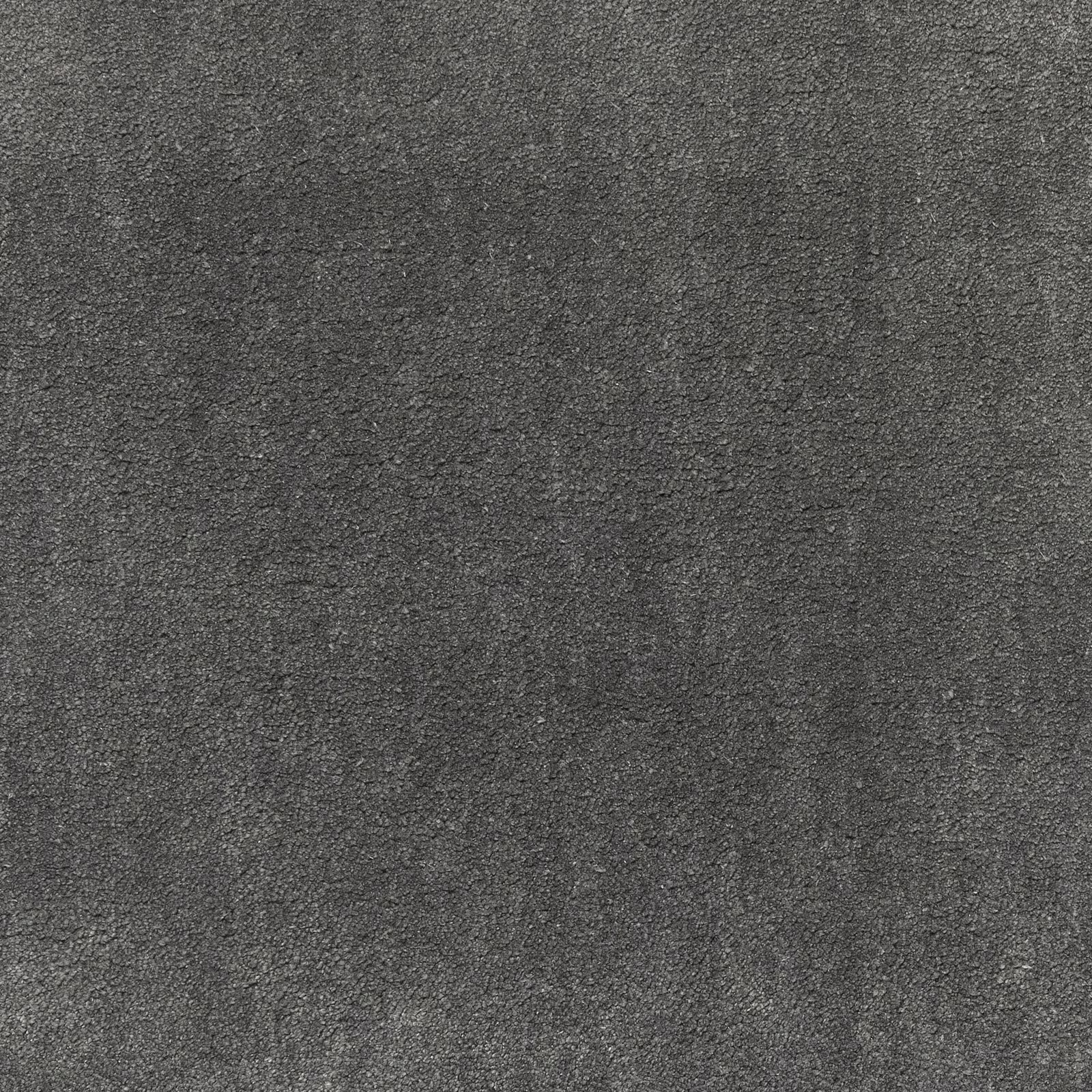Deep charcoal-grey textile swatch with fine mottled texture and subtle tonal variation
