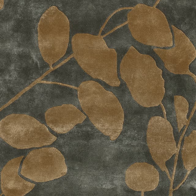 Large camel leaf motifs branch across a mottled dark lovat green ground