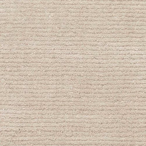 Warm pale-grey Rampur carpet with softly ridged horizontal texture and taupe flecks