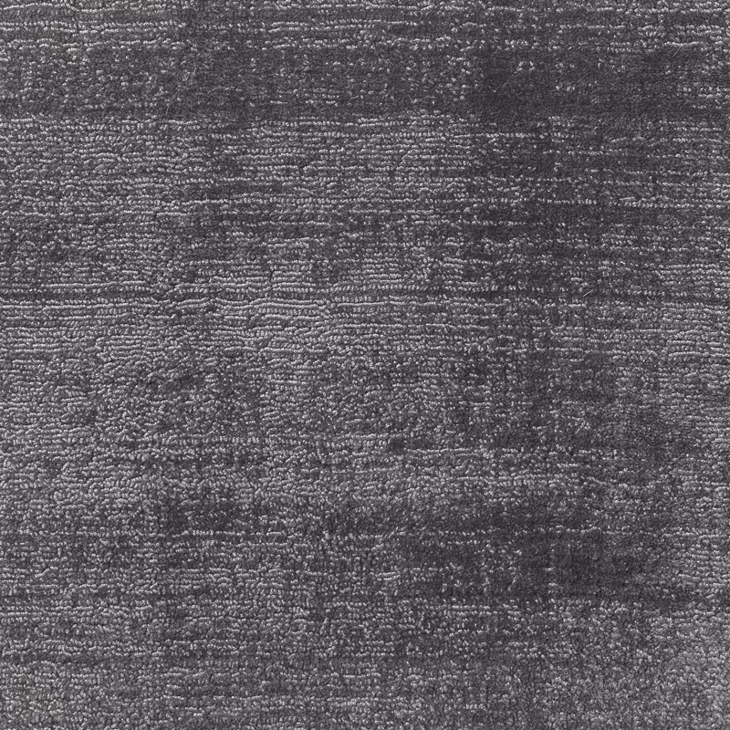 Deep charcoal grey fabric with dense horizontal ridges and mottled woven texture