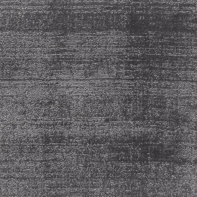 Deep charcoal grey fabric with dense horizontal ridges and mottled woven texture