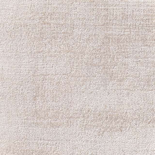 Warm ivory Shell carpet textile with dense nubby loops and subtle tonal bands