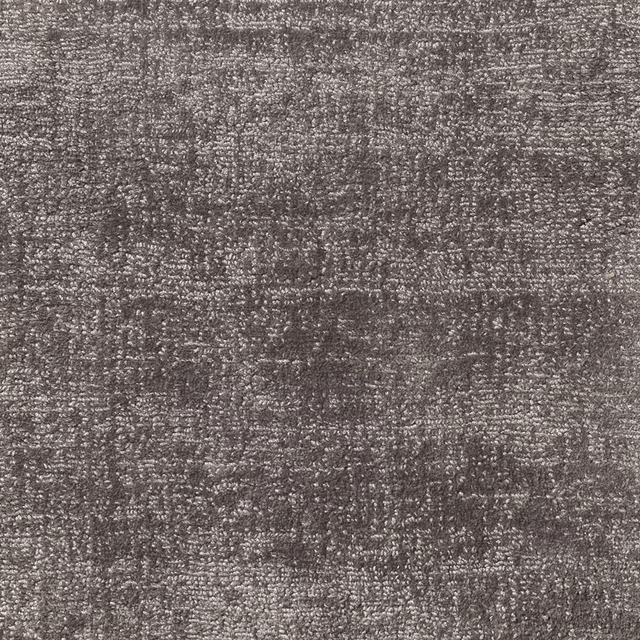 Close-up of Storm fabric in mottled charcoal grey with taupe flecks and dense woven texture