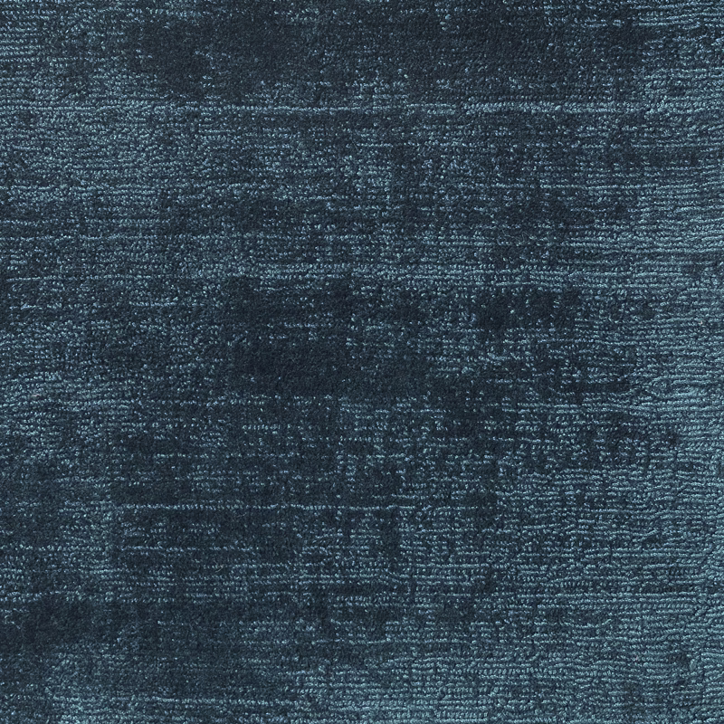 Close-up of Adriatic blue-teal carpet textile with mottled horizontal woven texture