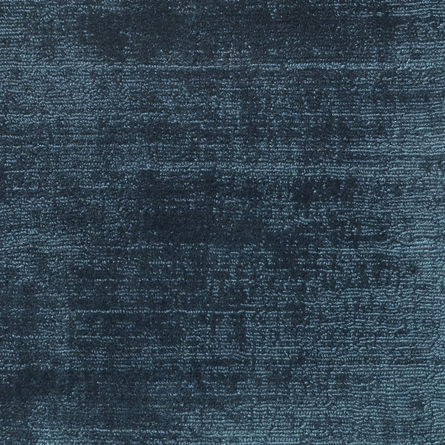 Close-up of Adriatic blue-teal carpet textile with mottled horizontal woven texture