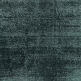Dense mottled blue-green teal textile with a rough, softly irregular woven surface