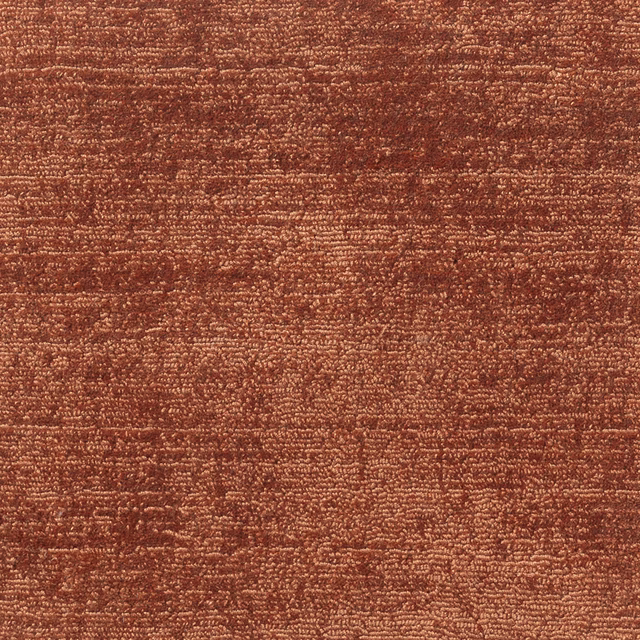 Copper-brown Satara textile showing dense nubby weave and irregular horizontal ridges