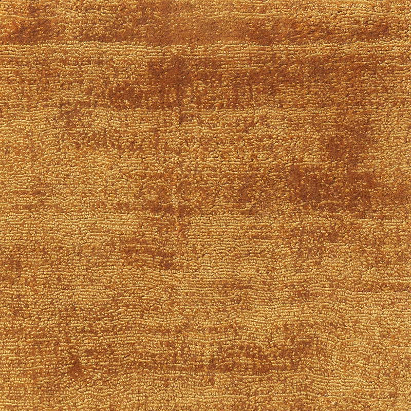 Warm ochre-gold textured carpet with irregular brown horizontal tonal bands