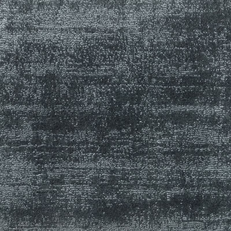 Close-up of charcoal blue-grey loop texture with irregular horizontal striations
