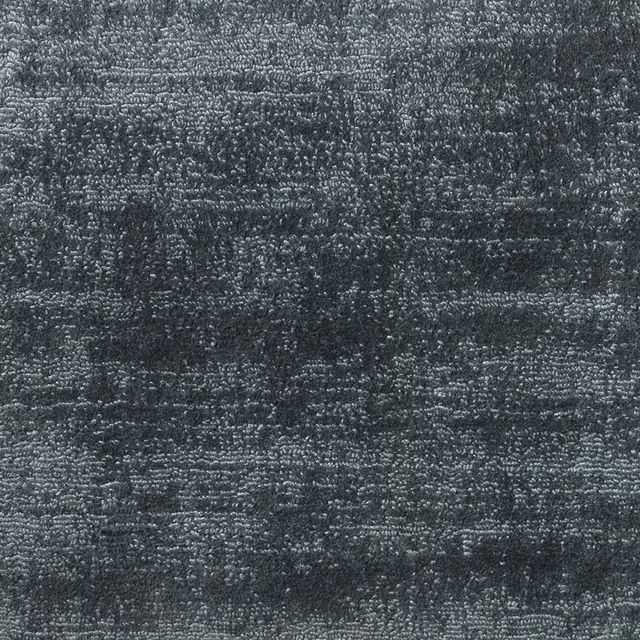 Close-up of charcoal blue-grey loop texture with irregular horizontal striations