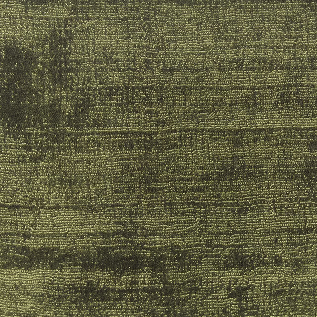 Close-up of deep moss olive textile with irregular horizontal ridges and tactile woven texture