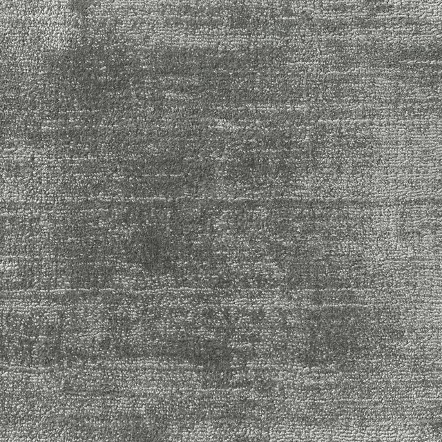 Mottled graphite-grey carpet with dense nubby pile and horizontal tonal bands