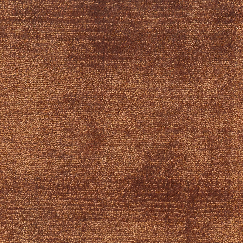 Warm ochre-brown textile with dense nubby weave and subtle darker tonal bands