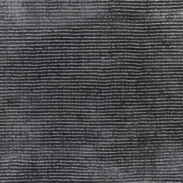 Charcoal-grey carpet textile with fine horizontal ribs and subtle pale flecking