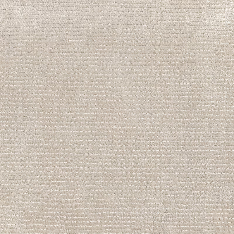 Pale Snow ivory carpet with fine horizontal slub texture and softly flecked weave
