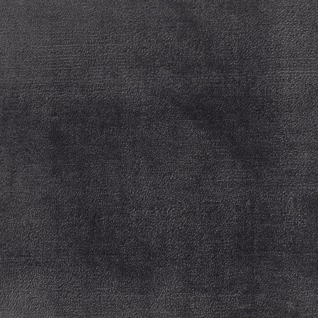Dark gunmetal carpet textile with a fine, softly mottled charcoal surface