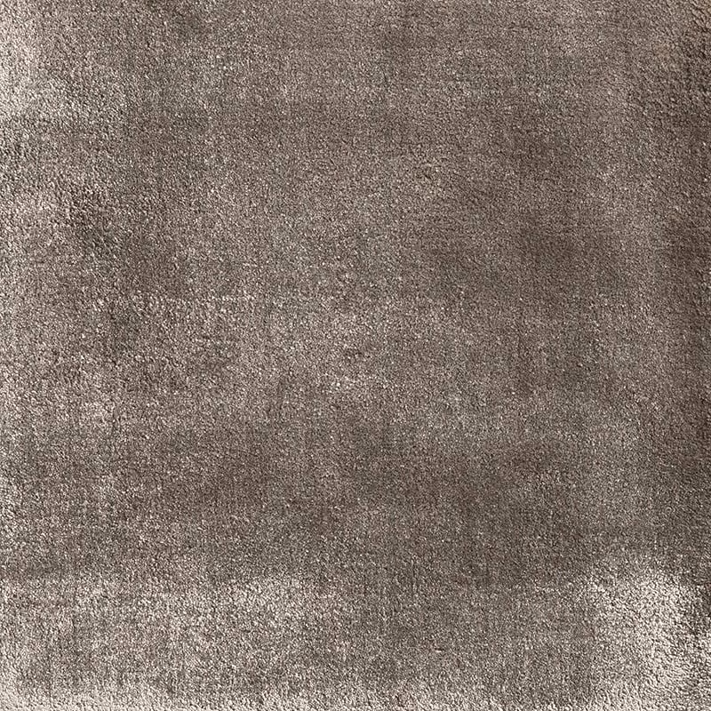 Mottled pewter-grey textile with a dense, softly shimmering textured surface