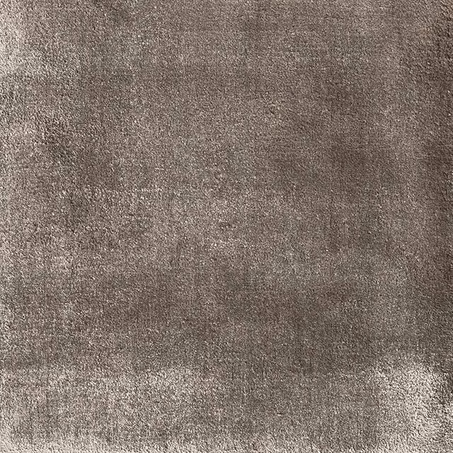 Mottled pewter-grey textile with a dense, softly shimmering textured surface