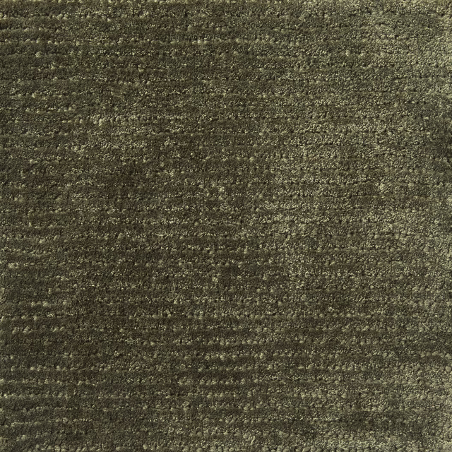 Close-up of muted olive-khaki Caper with dense nubby weave and horizontal tonal texture