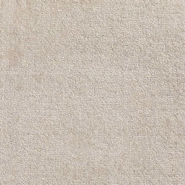 Pale feather-beige carpet swatch with dense nubby loops and subtle tonal flecks