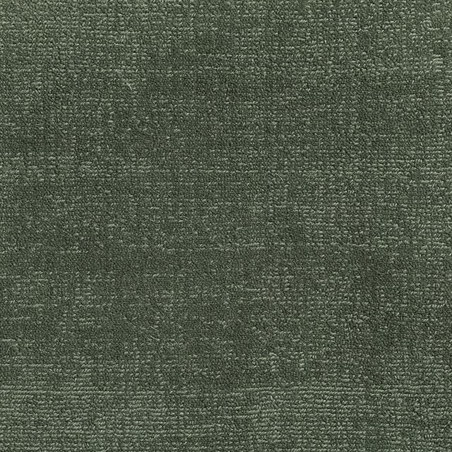 Close-up of Juniper’s deep olive-green carpet weave with mottled grey texture