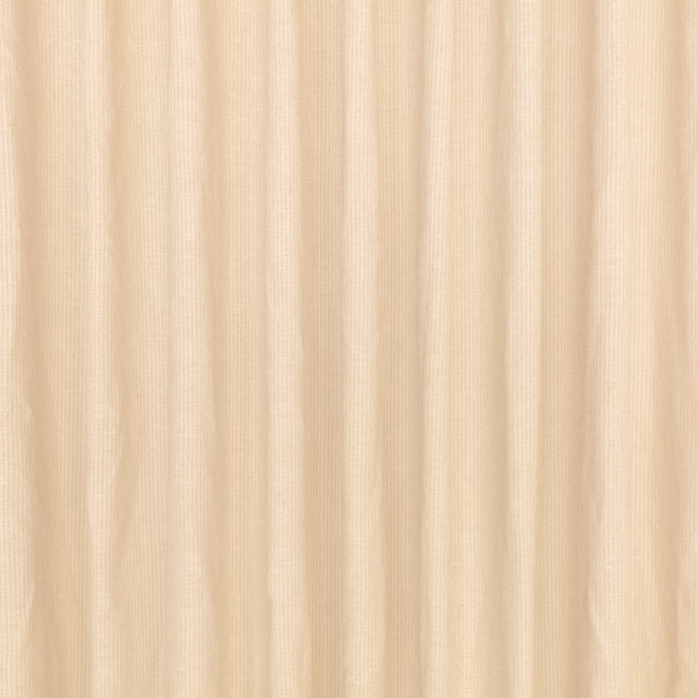 Warm pale beige fabric with fine vertical ribbing and softly shifting folds