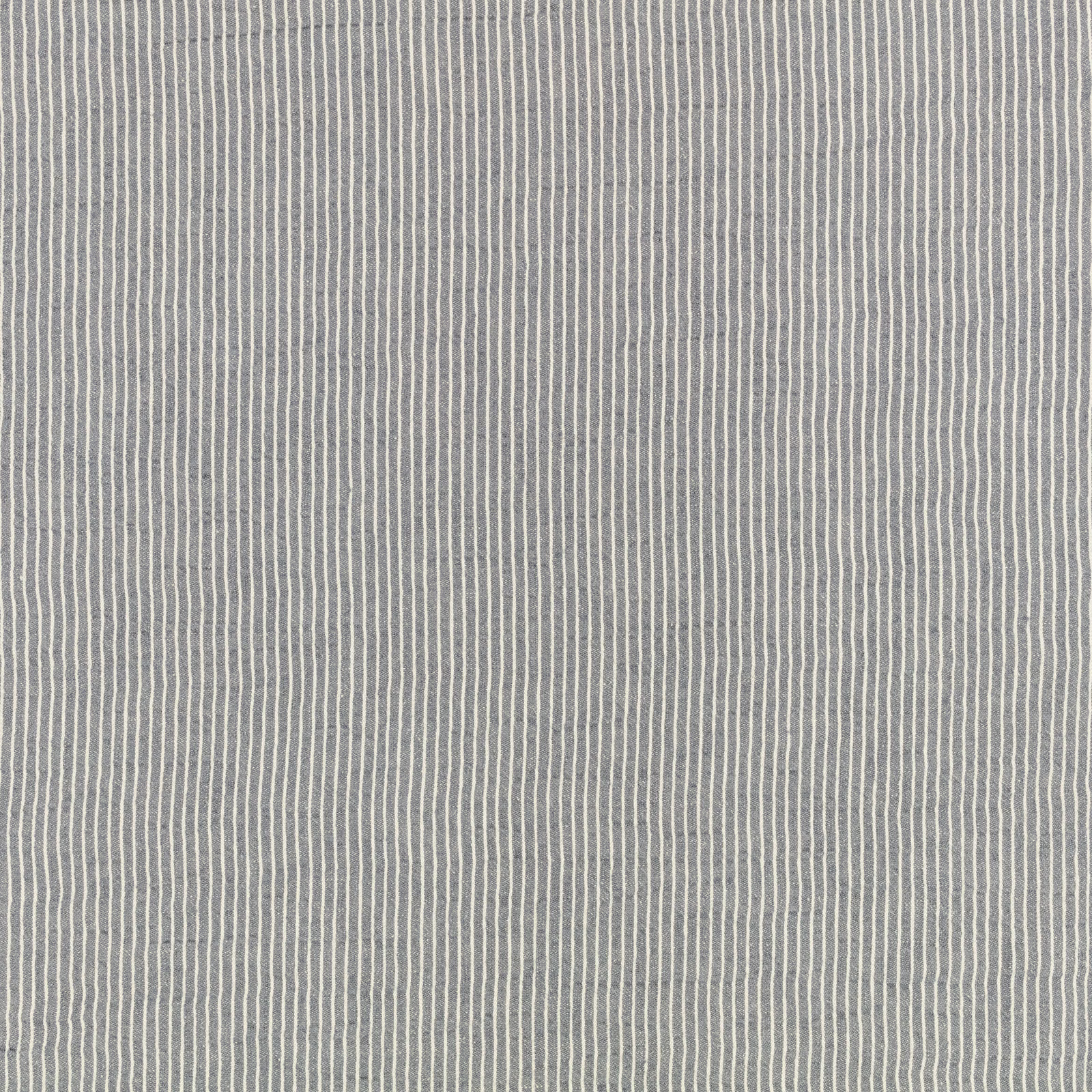 Muted blue-grey fabric with fine, irregular pale vertical stripes and a lightly textured weave
