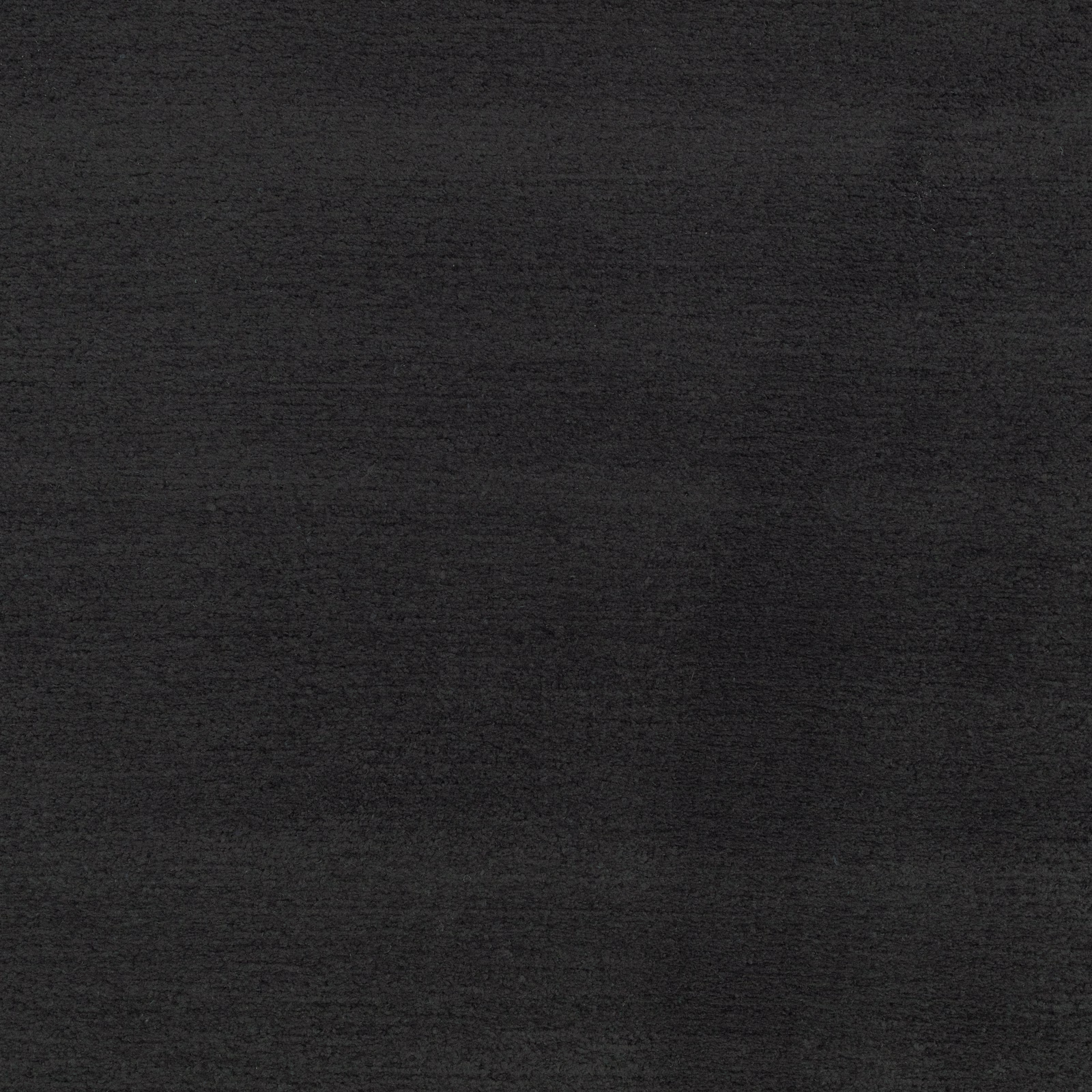 Jet-black woven upholstery surface with subtle horizontal texture and tonal variation