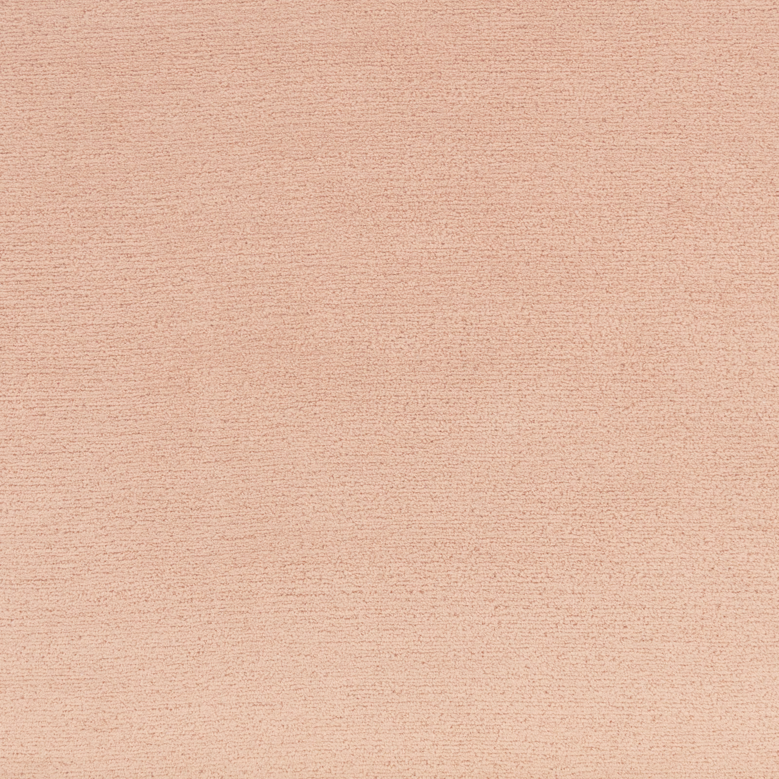 Close-up of finely textured powder-pink upholstery fabric with subtle horizontal grain