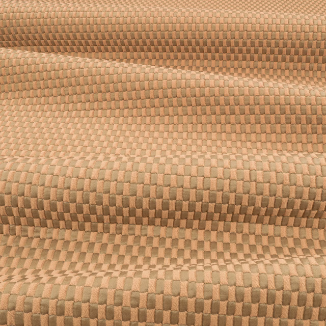 Muted olive and tan geometric upholstery weave with raised rectangular texture