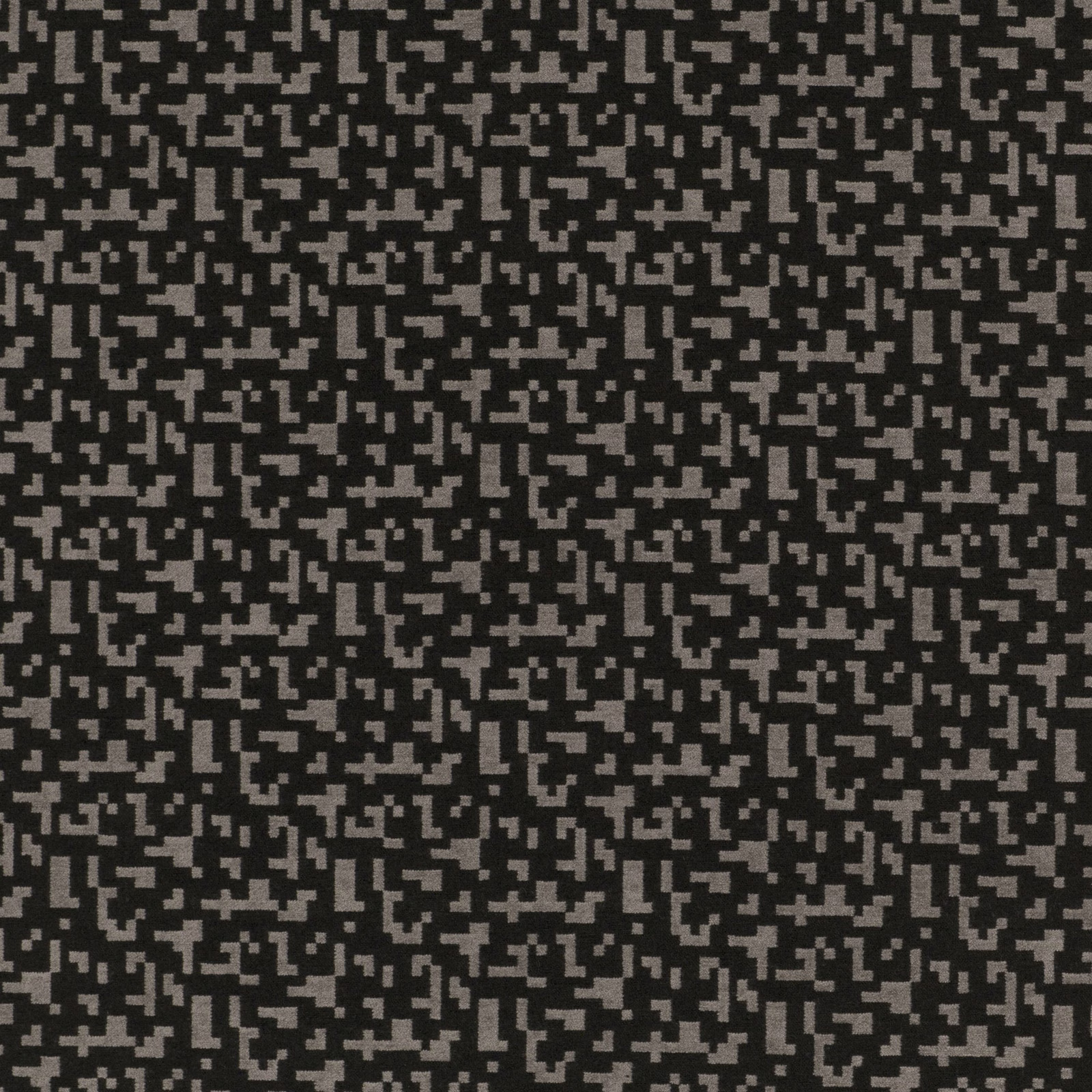 Charcoal woven textile with dense small grey pixel-like geometric marks