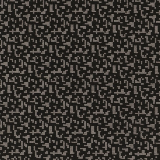 Charcoal woven textile with dense small grey pixel-like geometric marks
