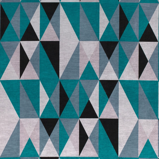 Woven teal fabric with charcoal, pale grey and blush-pink triangular blocks