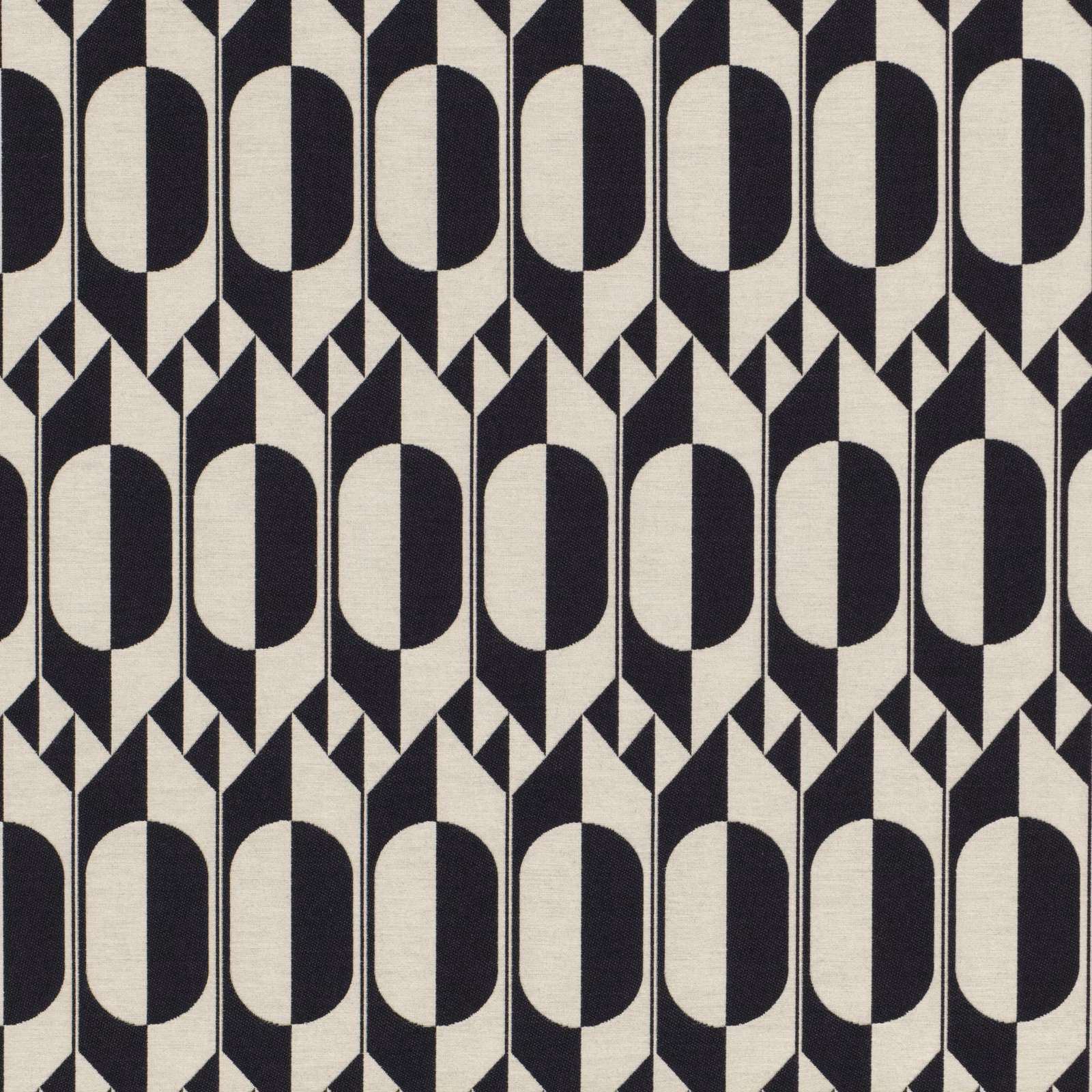 Black and ivory geometric woven fabric with repeating oval arches and pointed accents