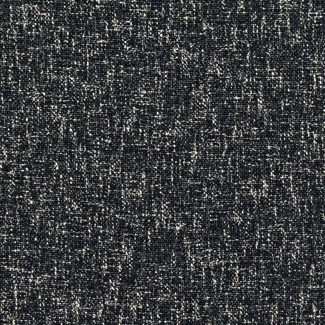 Close-up of dark teal woven fabric with pale flecks and irregular nubby texture