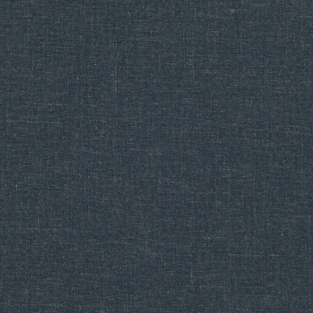 Close-up of dark blue-grey woven fabric with subtle charcoal crosshatch texture