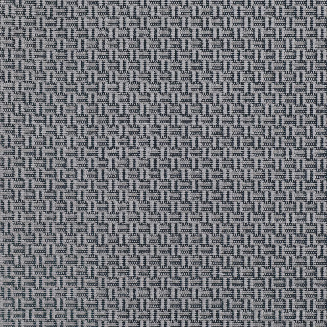 Close-up of cool storm-grey fabric with dense interlocking geometric woven texture